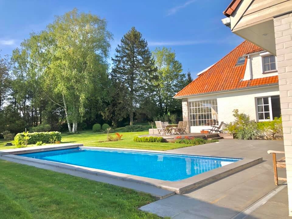 Extension d'une maison unifamiliale avec piscine à Tournai