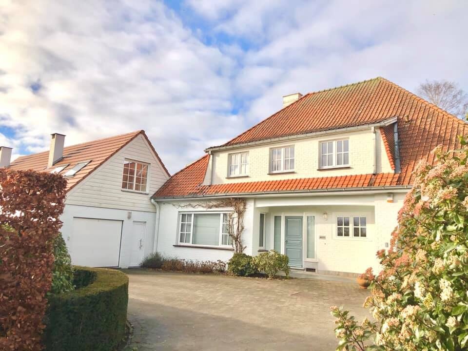 Extension d'une maison unifamiliale avec piscine à Tournai
